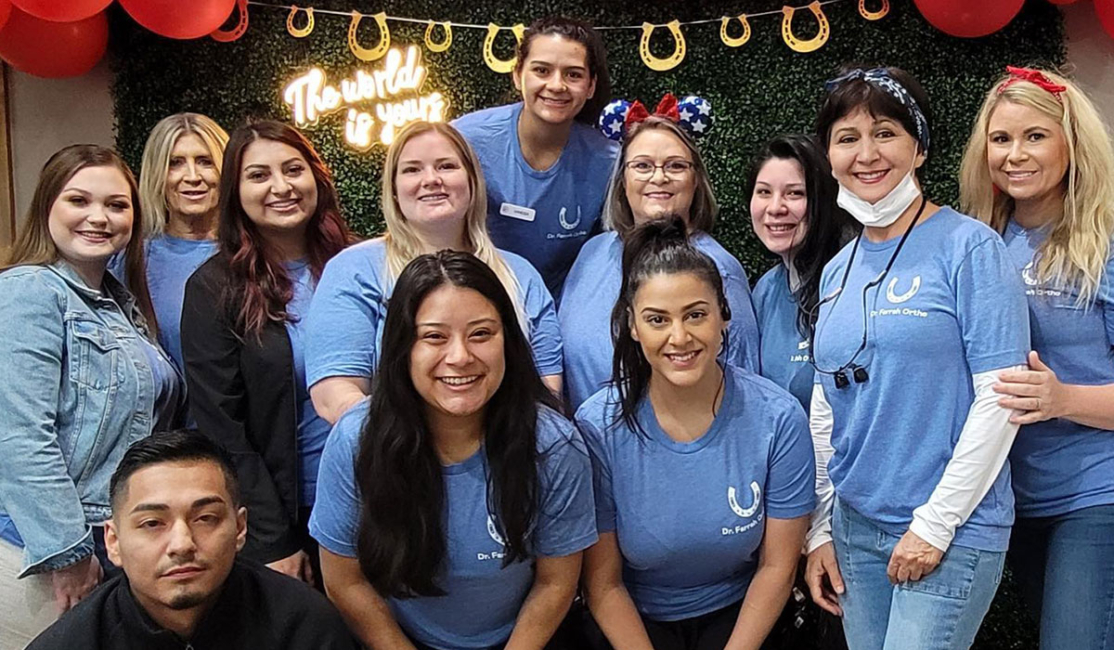 Dr. Farrah Orthodontics Team Photo at the orthodontic office in Pflugerville