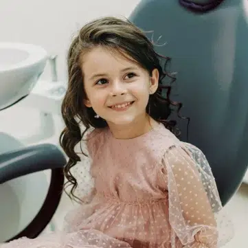 Little girl patient at first orthodontic appointment